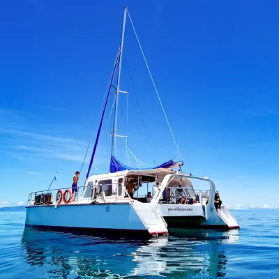 a small boat in a large body of water