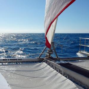 a person standing in front of a pier