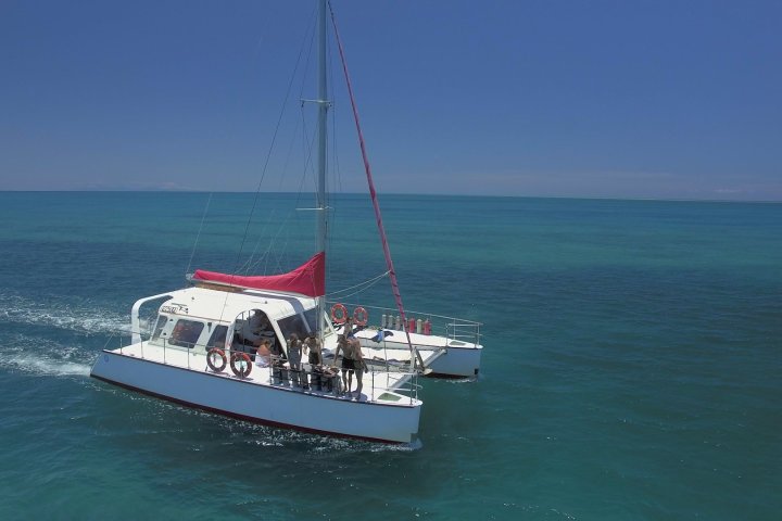 a small boat in a body of water