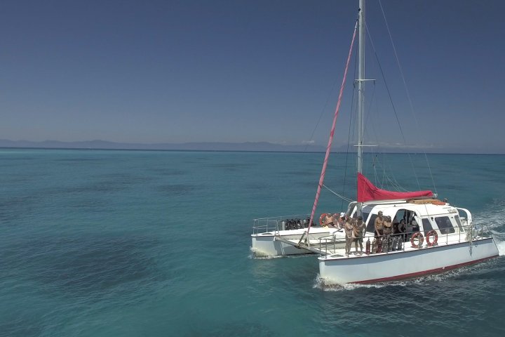 a small boat in a body of water