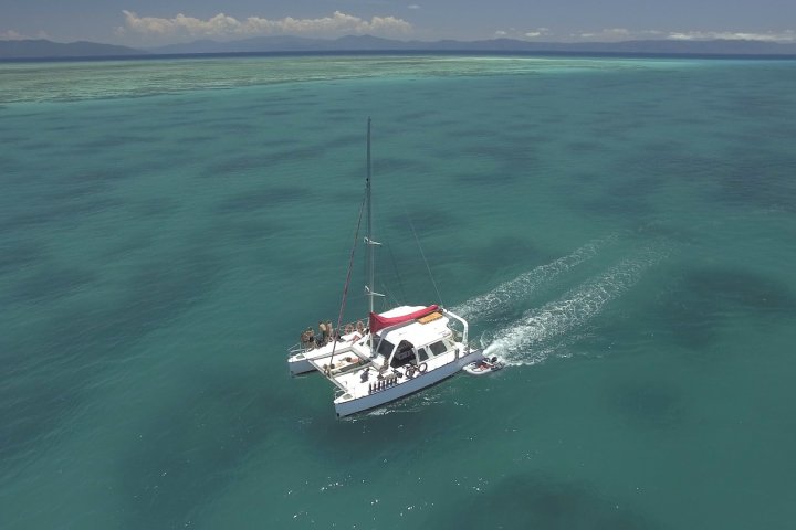 a small boat in a body of water