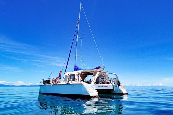 a small boat in a large body of water