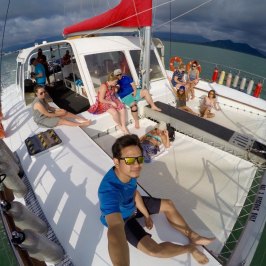 a man riding on the back of a boat