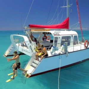 a boat is docked next to a body of water